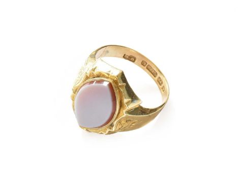 A 9 carat gold hardstone signet ring, finger size S1/2Gross weight 3.5 grams.