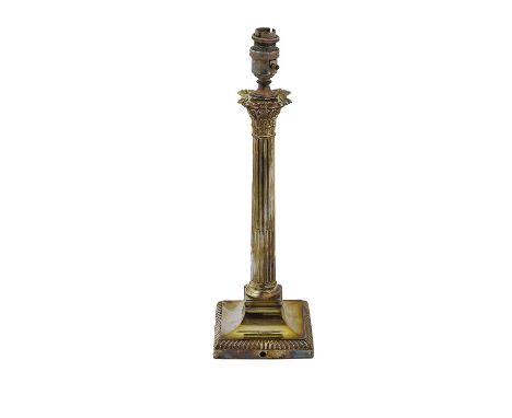 A George V Silver Candlestick, by Hawksworth, Eyre and Co Ltd., Sheffield, 1919, on square gadrooned base, the fluted stem te