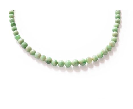 A graduated jade bead necklace, length 65cmGross weight 50.6 grams.