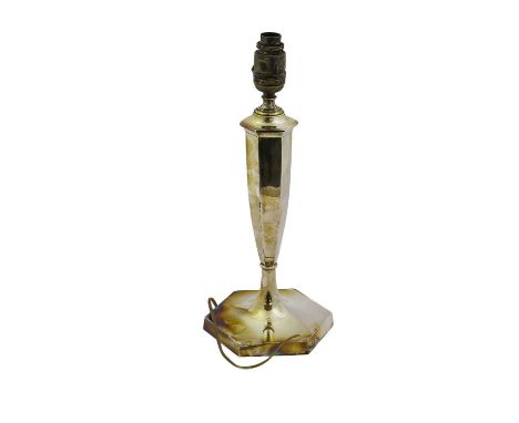 A George V Silver Candlestick, on six-sides base and with conforming tapering stem, later fitted for electricity, filled, 39c