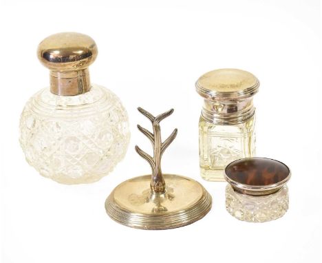 Two Silver-Mounted Cut-Glass Scent-Bottles, on globular with plain hinged cover, the other of square section with screw cover