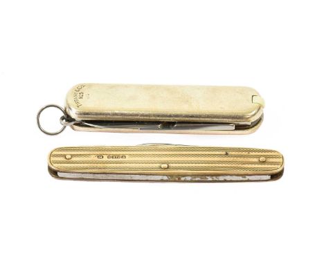 A Tiffany &amp; Co silver cased multi tool pocket knife; Together With: a 9ct gold pocket knife with engine turn engraving (2