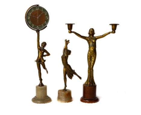 An Art Deco figural spelter time piece formed as a dancing girl, raised on a white onyx base; together with an Art Deco gilt 