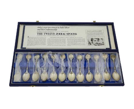 A Cased Set of Twelve Elizabeth II Silver Commemorative-Spoons, by John Pinches, Sculpted by David Cornell, London, From a Li