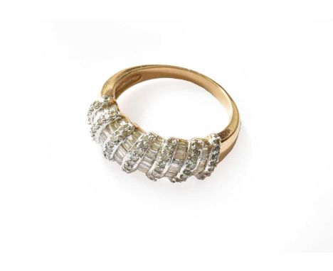 A 9 carat gold diamond half hoop ring, finger size PGross weight 5.3 grams.