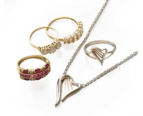 Two 14 carat gold dress rings; a 9 carat gold dress ring; together with a silver Clogau necklace, with matching ringTwo 14 ca