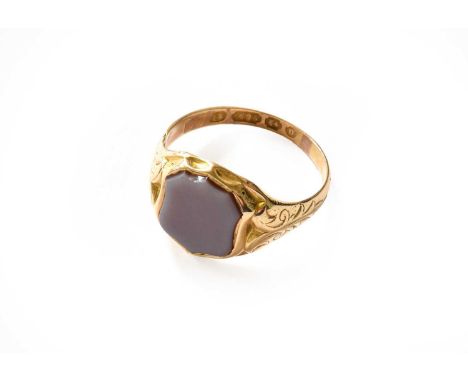 A 15 carat gold hardstone signet ring, finger size R1/2Gross weight 4.1 grams.