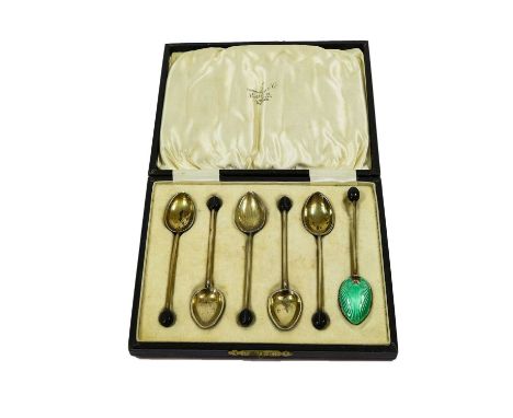 A Cased Set of Six Silver-Gilt and Enamel Coffee-spoons; a cased pair of silver dessert-stands and a cased three-piece condim