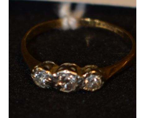 A diamond trilogy ring, three linear set round old brilliant cut diamonds, estimated total diamond weight approx 0.20ct, plat