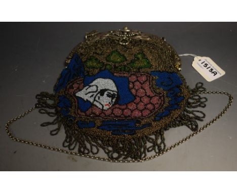 A French Art Nouveau beadwork evening purse, the olive silk interior with pocket and vanity mirror, the silver coloured metal