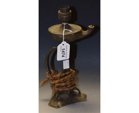 An Art Nouveau pewter table lamp as an Aladdin's style lamp