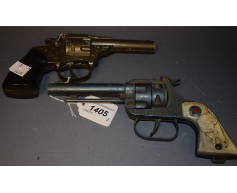 A Lone Star pistol; a Starksy and Hutch pistol 