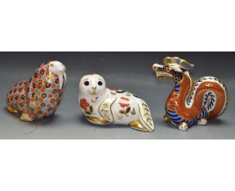 Royal Crown Derby paperweights - a seal a walrus, a dragon, all first quality, no stopper (3)