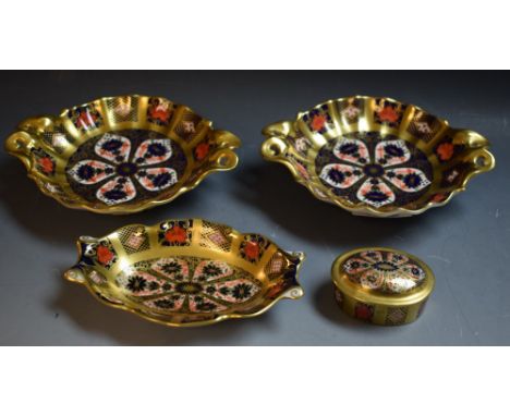 Royal Crown Derby - a pair of 1128 pattern footed pin dishes;  another oval pin dish; an 1128 oval lidded trinket box; all fi