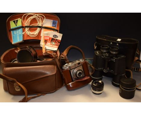 Photographic Equipment - a Zeiss Ikon camera in leather case; a Sangamo Weston Master IV light meter in leather case; a pair 