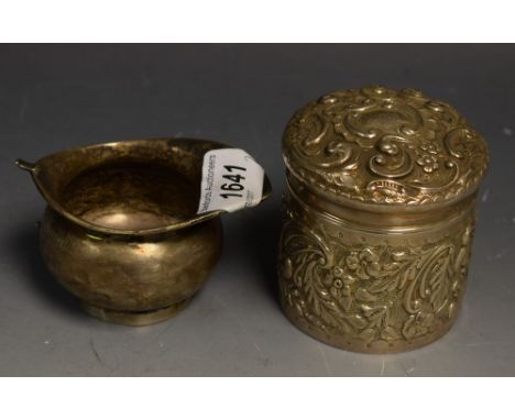 An Edwardian silver dressing table tidy with cover, Birmingham 1902, 75g; another, cream jug, 1918, 46g (2)