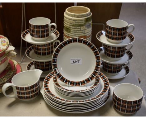 A Midwinter tea service, geometric brown and black design on white ground, six cups, saucers, side plates, bread and butter p