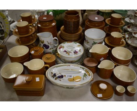 A Hornsea Pottery Saffron pattern part dinner and tea set comprising plates, side plates, soup bowls, cups and saucers, jugs,