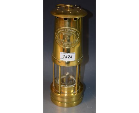 A brass miner's lamp, E Thomas and Williams, Cambrian, Aberdare, Wales, N0 30976, 25cm high
