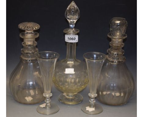 A George III facet cut mallet shaped decanter, c.1800; another, c.1900, cut glass champagne flutes