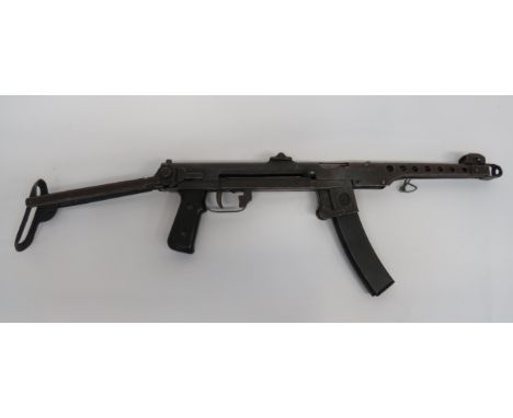 Deactivated Chinese Type 54 Sub Machine Gun7.62 mm barrel.  Outer steel shroud and body casing.  Front ear protected sight.  