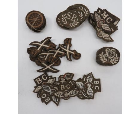 Selection of Army Trade Badgesconsisting 12 x LG in wreath .. 10 x wheel ... 10 x BC over winged wheel ... 10 x MC over winge