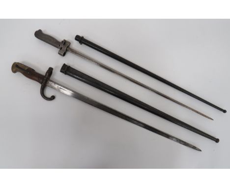 French M1874 Gras Bayonet and M1886/93/16 Lebel BayonetGras bayonet, 20 3/4 inch, T section blade.  The back edge with maker 