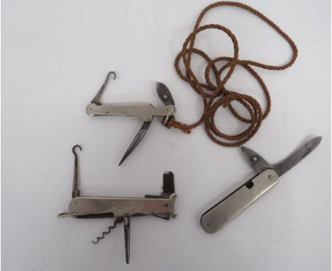 Three Various Clasp Knivesincluding a white metal, shooter example.  The end with 12 bore &amp; 16 bore extractor, button hoo