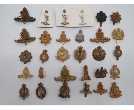 Selection of Corps Cap Badgesincluding KC brass Military Police ... KC bi-metal Royal Corps of Signals ... KC brass General L