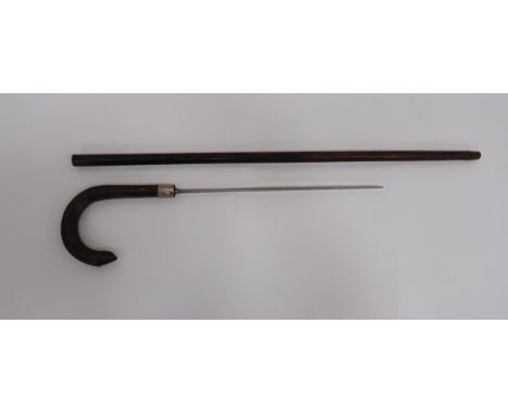 19th Century Sword Stick14 1/4 inch, square form blade with top mounted T bar locking catch.  Silvered ferrule with floral en