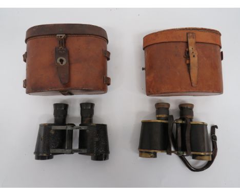 Two Pairs of WW1 Pattern Military Binocularsconsisting 6 x 30, Crown Optical Company binoculars.  Blackened brass frames.  Co
