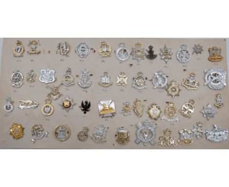 Good Selection of Anodised Cap Badgesincluding QC 9/12 Lancers ... QC Queens Royal Irish Hussars ... QC Westmorland &amp; Cum