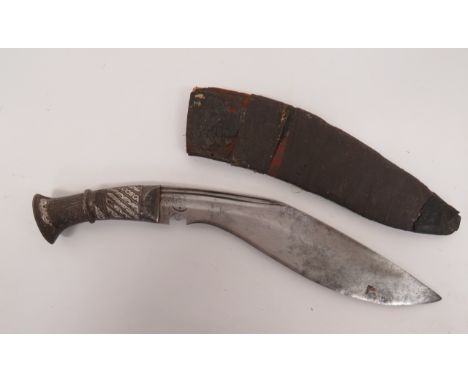 19th Century Ornately Decorated Kukri12 1/4 inch, single edged blade of typical form.  Double rear side fullers.  Steel, geom