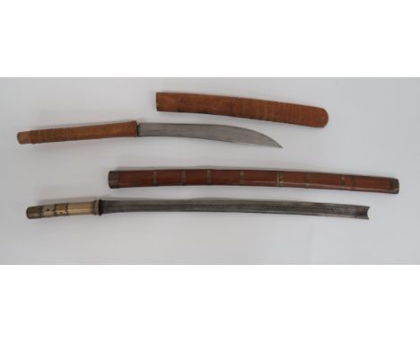 Two Various Burmese Dha Swordsconsisting 22 1/2 inch bladed example.  Crescent end with single edge and large fuller .  Conic