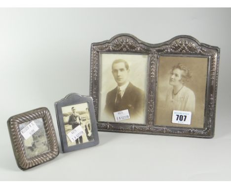 A good antique silver 'husband &amp; wife' twin-portrait frame with easel support &amp; two further smaller silver frames Con