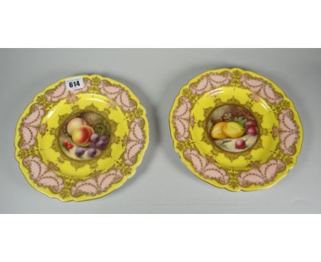 A pair of Royal Worcester porcelain plates by Richard Sebright in yellow ground & with salmon pink panelled border, profuse g