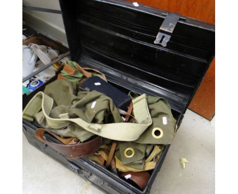 A vintage tin trunk containing a soldier's uniform &amp; accessories including Sam Brown belt &amp; tan leather gun holster E