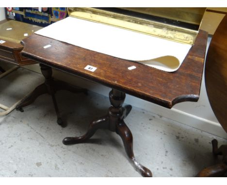 An antique oak tripod table with shaped top Condition Report: please request via email. Condition reports not stated with des