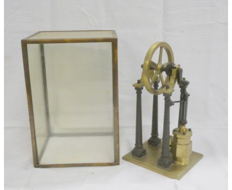 19th century model vertical single cylinder steam engine, in cast iron and brass, 29cm, with glazed case.&nbsp;