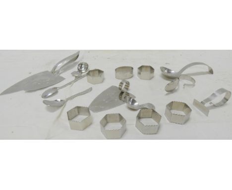 Collection of&nbsp;Keswick School of Industrial Arts Firth Staybrite comprising; seven napkin rings, two caddy spoons, long h