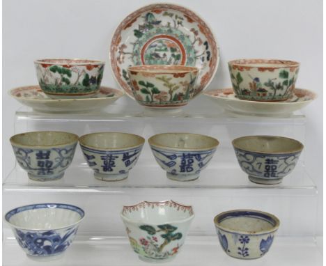 Set of three Chinese porcelain Famille Verte tea bowls and saucers decorated with cottages and figures in landscapes, each 7.