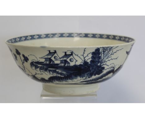 18th century Worcester porcelain bowl decorated in "Precipice" pattern in underglaze blue with lattice border to interior rim