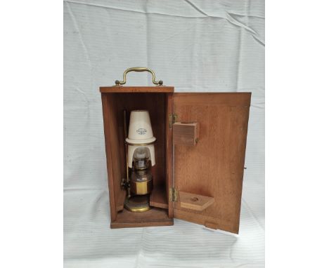 Microscope lamp by Swift, London, with pottery shade (repaired), in case, 36cm. 
