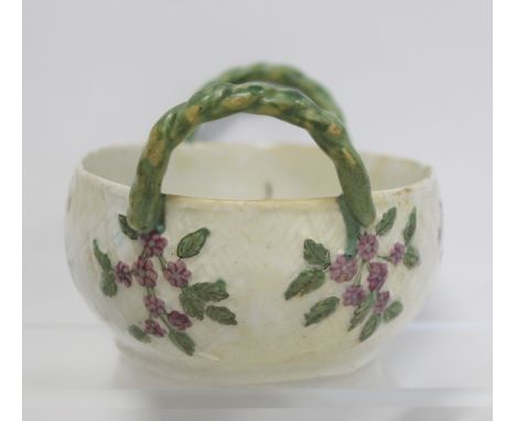 18th century Chelsea porcelain sweetmeat dish of oval form with twin rope twist handles, moulded basket weave effect ground a