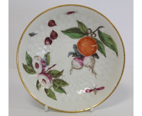 18th century Chelsea porcelain saucer of circular form with moulded fish scale ground and polychrome enamel hand painted deco