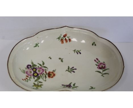 18th century Chelsea porcelain dish of lobed kidney shape with painted polychrome enamel floral sprays and brown line to rim,