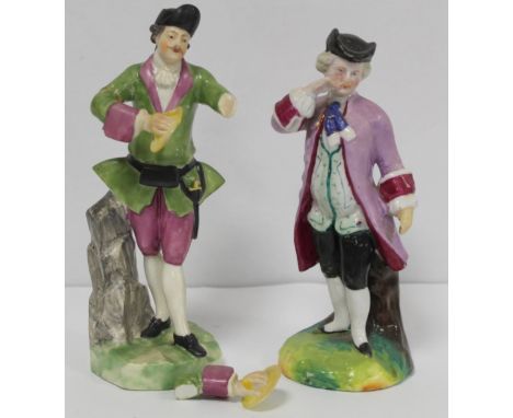 19th century Continental porcelain figure of a man in 18th century dress playing cymbals, 17.5cm high; also another figure of