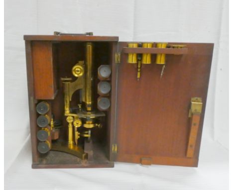 Brass binocular microscope by R &amp; J Beck, No. 11699, 34cm, closed in mahogany case with accessories.