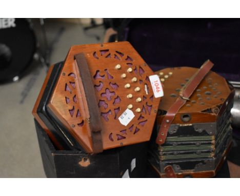 An early 20th Century Lachenal Concertina, labelled 53314, with wooden case and an early to mid 20th Century unnamed concerti