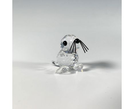 A delightful multi-faceted figure of a baby seal accented with black eyes, nose and whiskers. Swarovski acid mark. This item 
